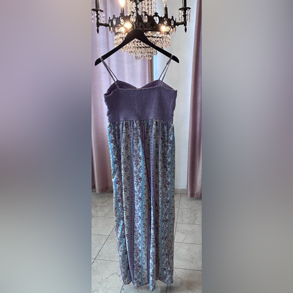 Jumpsuit with elastic back.